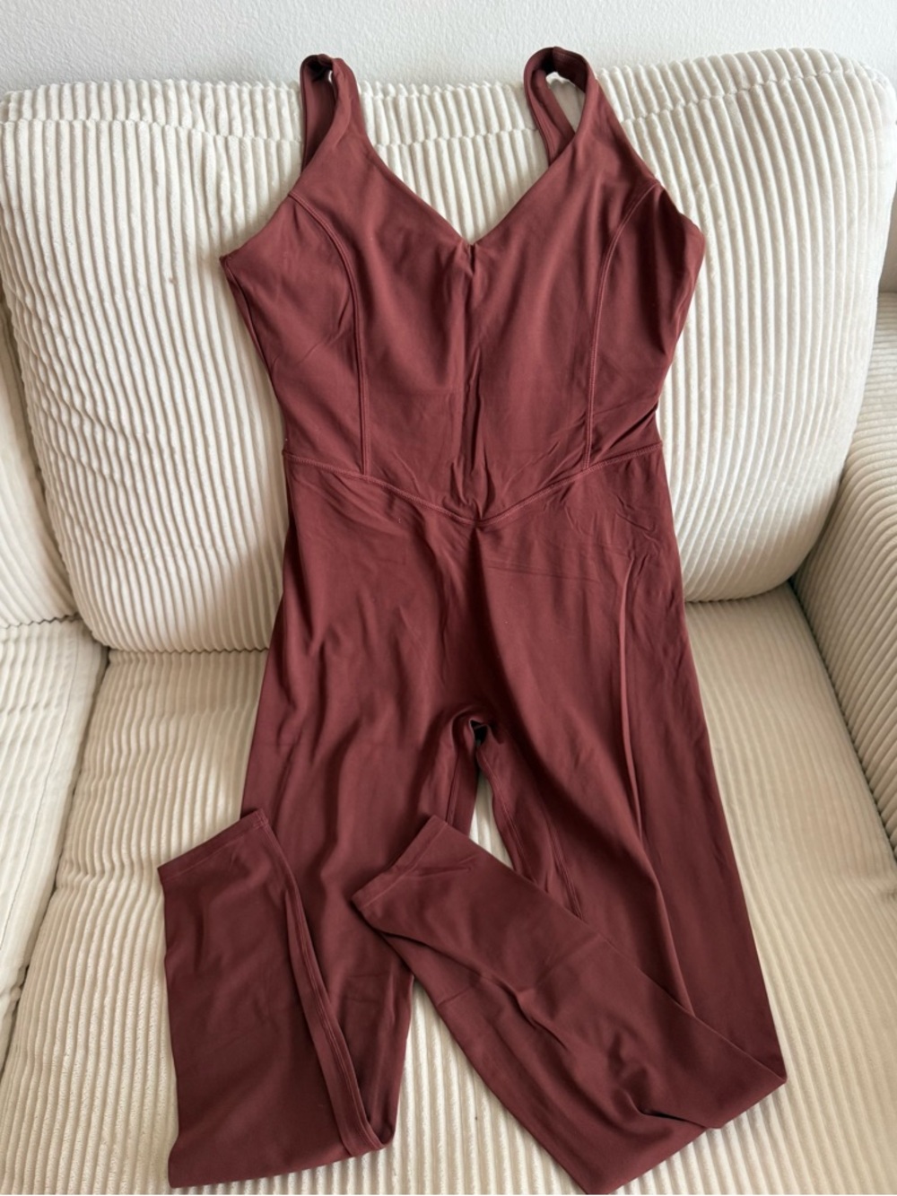 vitality orange athletic jumpsuit